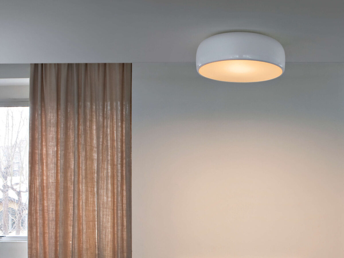 An industrial-inspired Flos Smithfield Ceiling lamp in [specify color, e.g., "mud" or "red"], with a smooth, painted aluminum shade and a frosted polycarbonate diffuser for glare control.