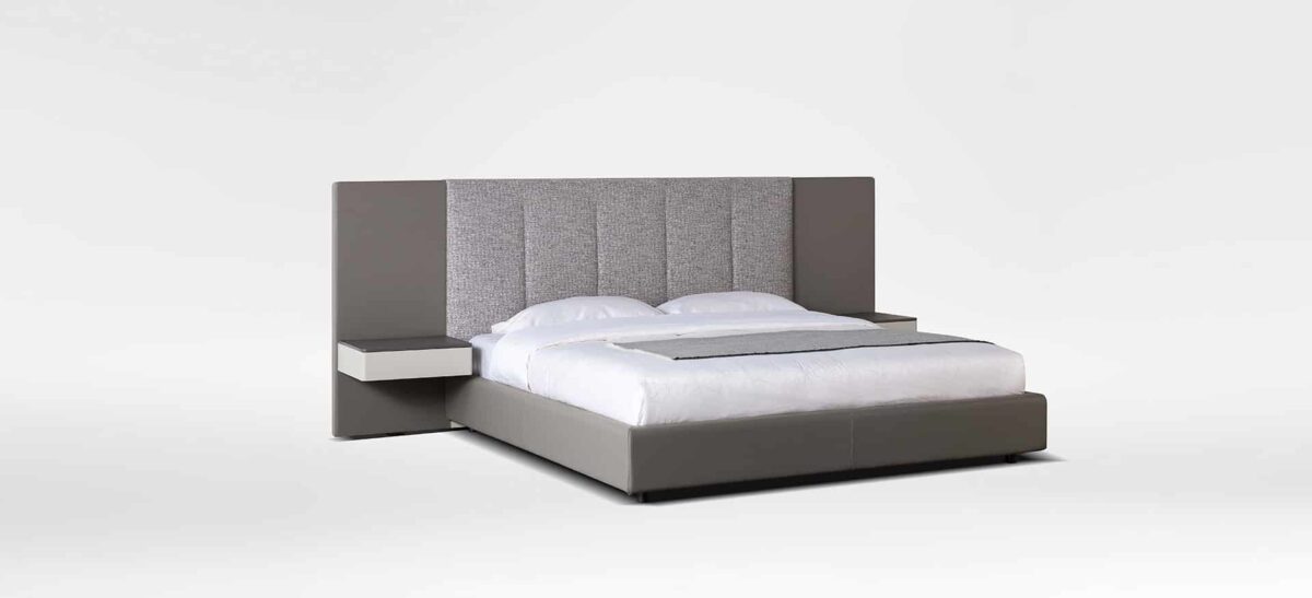 Spacious upholstered bed with wide headboard and contemporary design by Camerich.