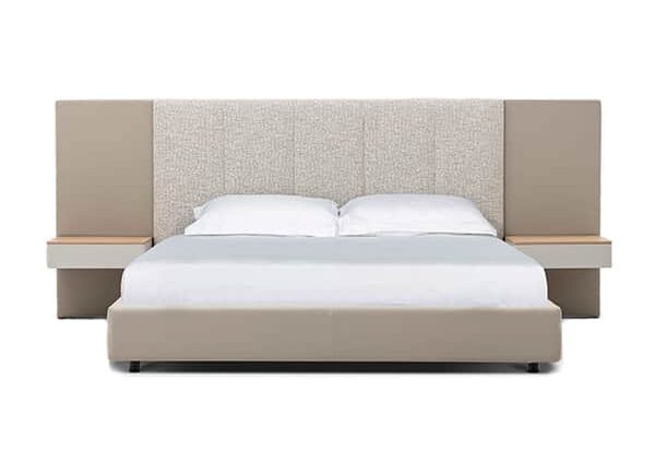 Spacious upholstered bed with wide headboard and contemporary design by Camerich.