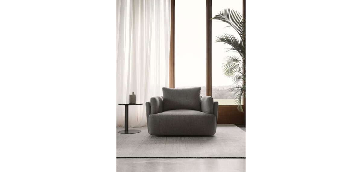 Sunset armchair by Nicoline, featuring a minimalist design with plush cushions, adding modern elegance to interiors in Royal Oak, Michigan.