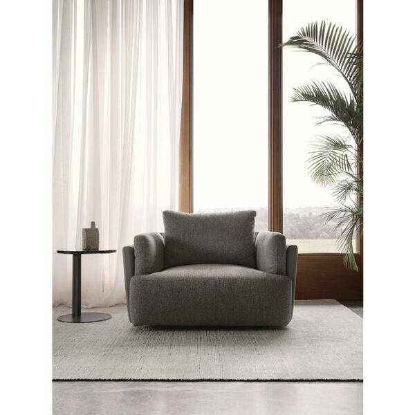 Sunset armchair by Nicoline, featuring a minimalist design with plush cushions, adding modern elegance to interiors in Royal Oak, Michigan.