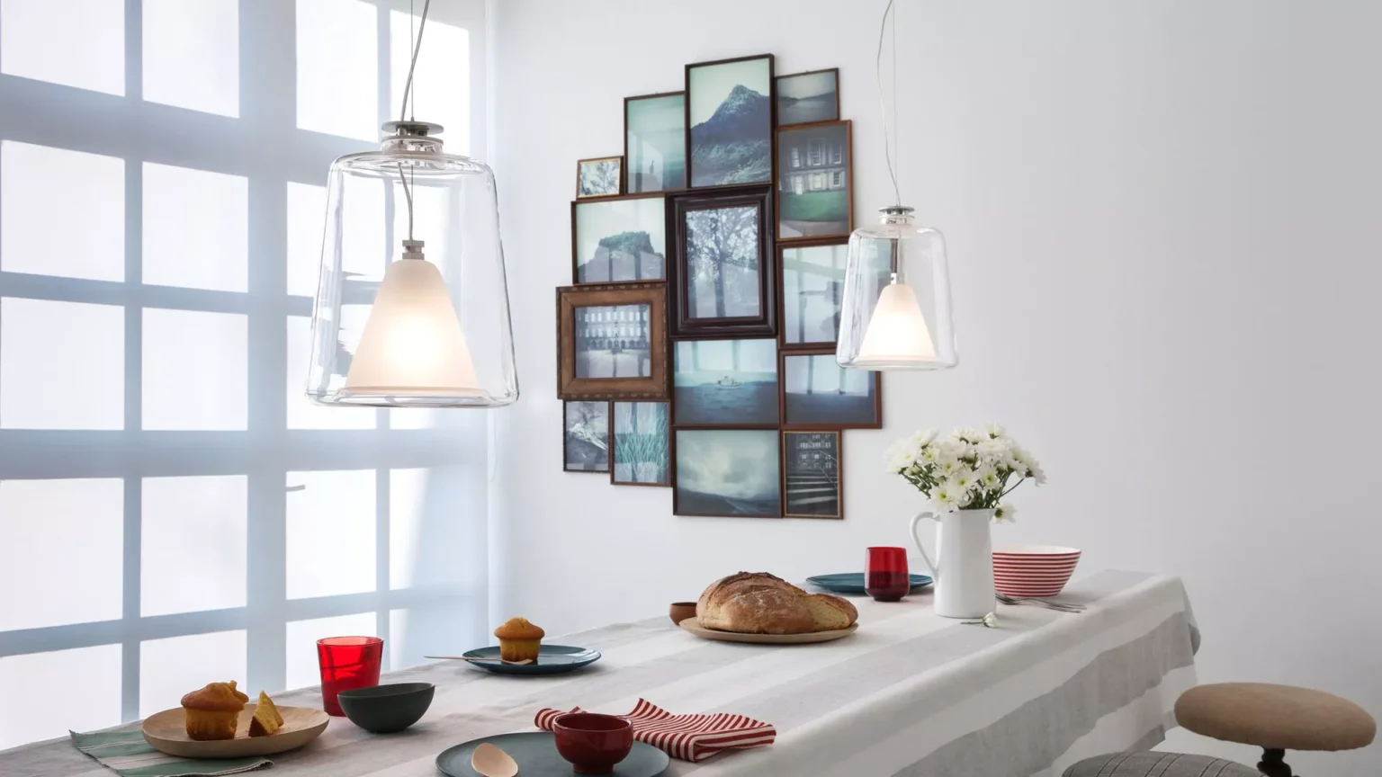 “Lanternina by Oluce contemporary designer mini lantern – compact glass lamp with sleek metal accents and soft glowing illumination”