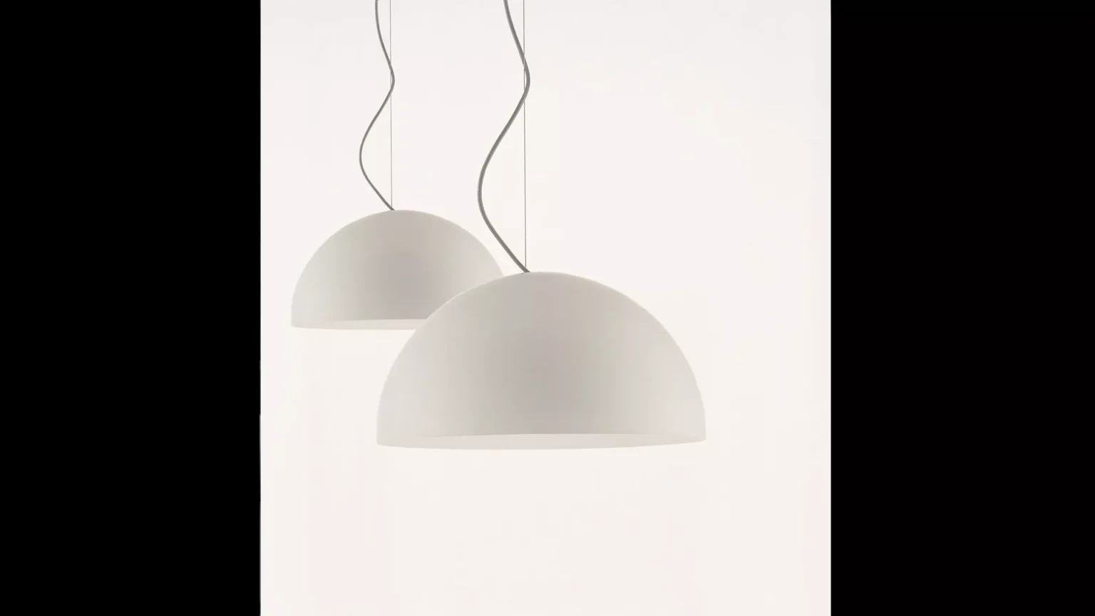 “Sonora by Oluce modern Italian floor lamp – slender metal stem with adjustable conical shade and sleek minimalist design”