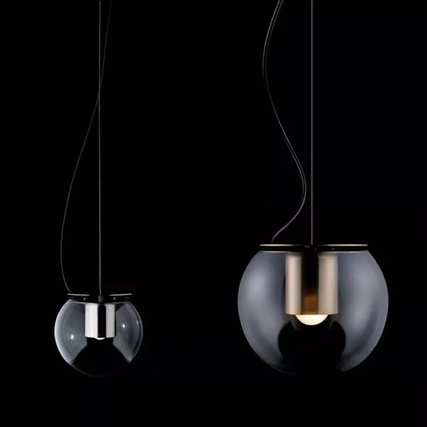 “The Globe by Oluce stylish Italian lamp – round glass globe with warm illumination and refined metal stand”