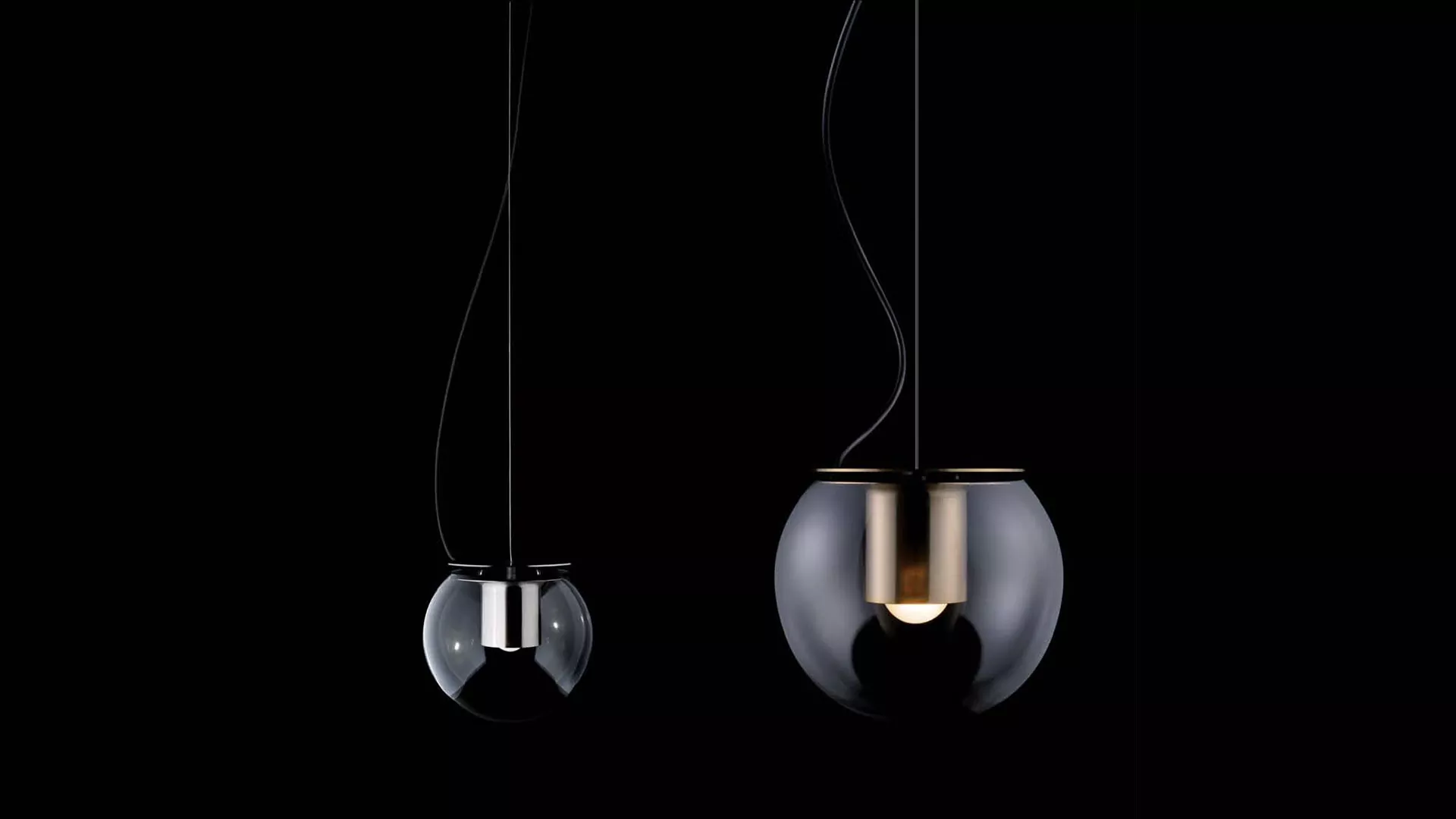 “The Globe by Oluce stylish Italian lamp – round glass globe with warm illumination and refined metal stand”
