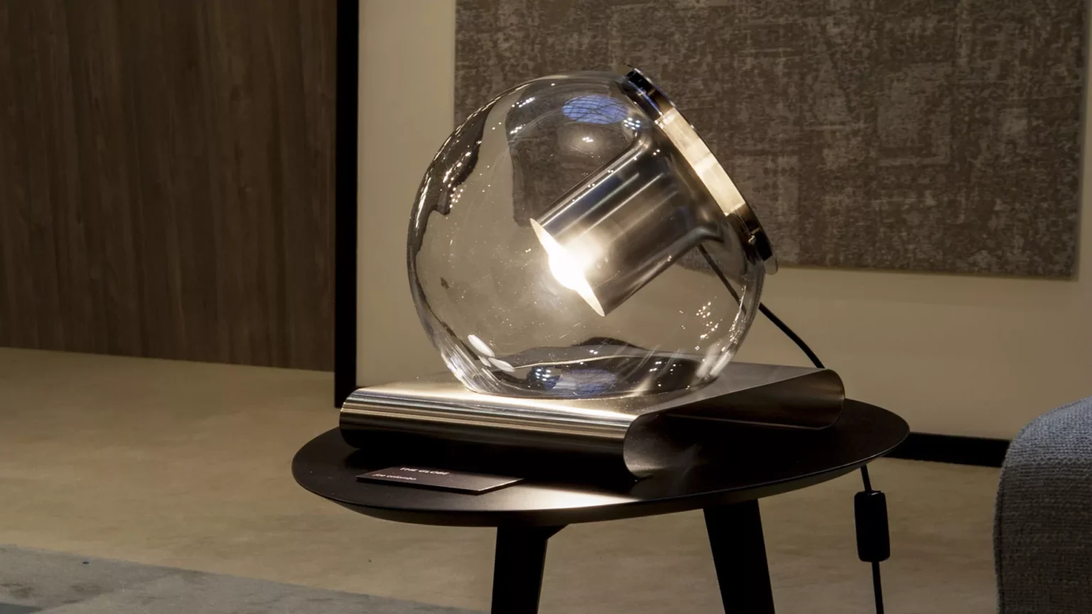 “The Globe by Oluce designer lighting – contemporary globe-shaped glass lamp with minimal metal structure”