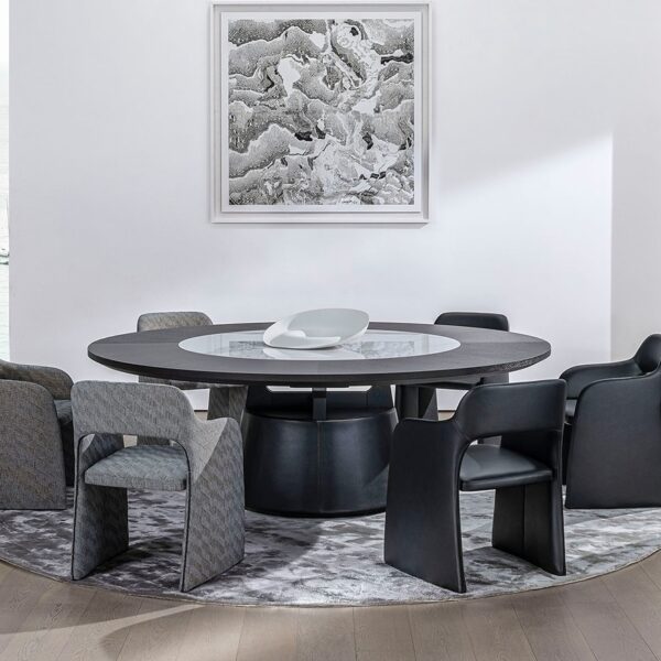 Large dining table with sleek wood surface and minimalist metal legs by Camerich.