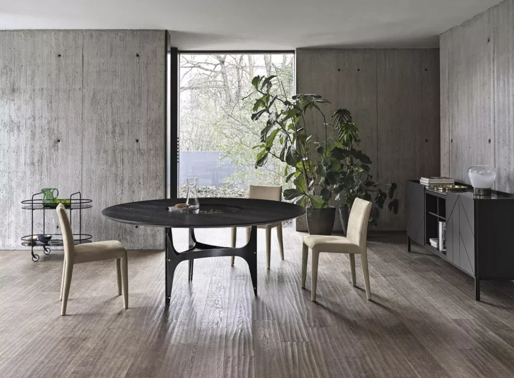 Universe Round by Bontempi – round dining table with lacquered steel arched legs and oak veneer top.
