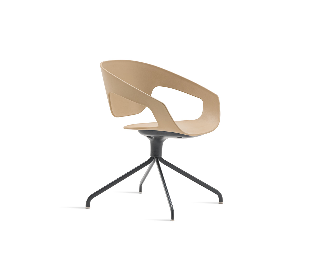 "Swivel Polypropylene Vad chair by Casamania in matte white polypropylene with a 360° rotating base."