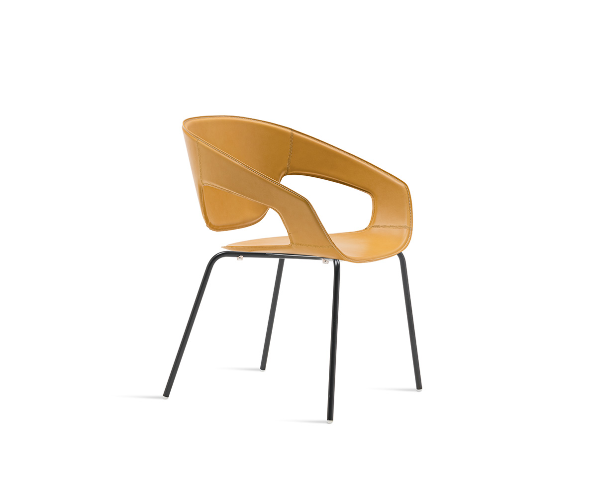 "Vad Stackable Upholstered Chair by Casamania in soft grey fabric, stacked neatly in a modern dining room."