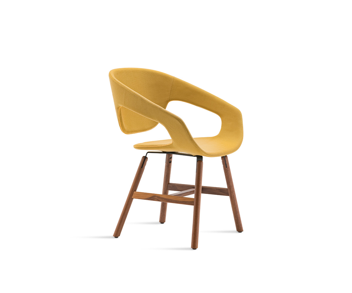 "Vad Wood Upholstered Chair by Casamania with smooth leather upholstery and elegant natural oak legs."