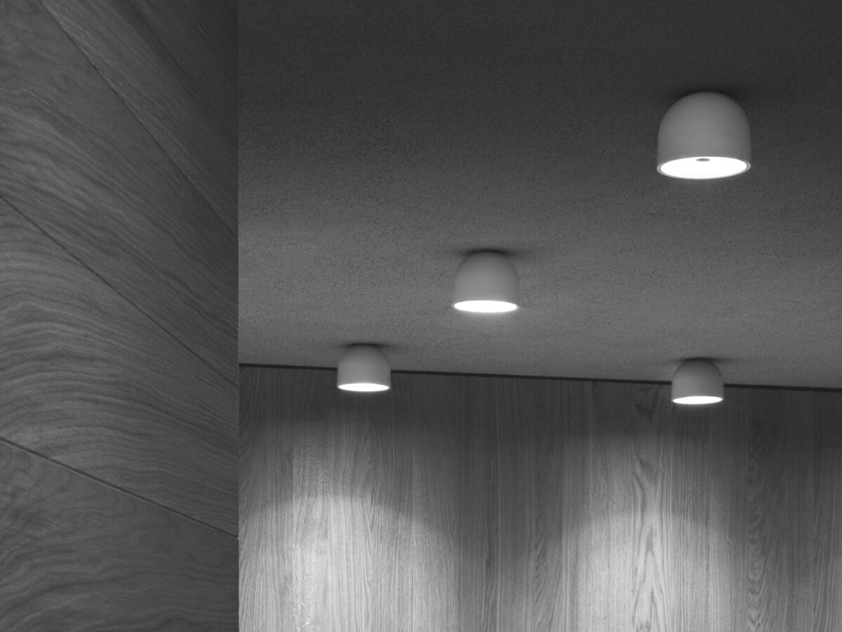 Modern and discreet, the Flos Wan Ceiling/Wall lamp, a petite bowl-shaped light that can be installed on either a ceiling or wall, ideal for task lighting or accentuating specific areas.
