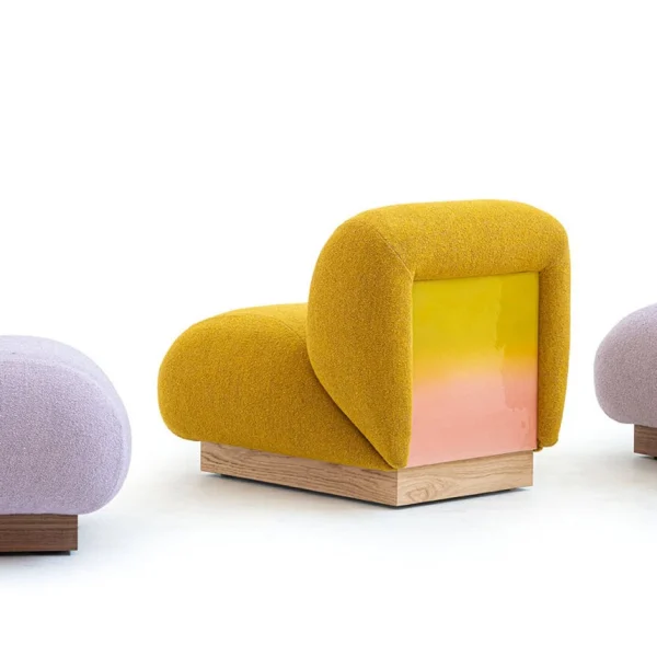Clay armchair by Moroso showcasing curved backrest and sleek silhouette at the Michigan Design Center