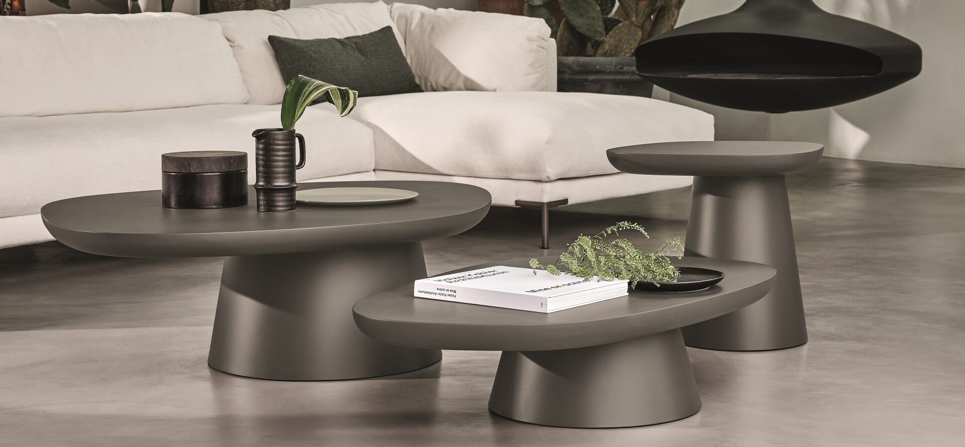 “STONE-IN coffee table by Ditre Italia – contemporary Italian table featuring sculpted stone-look base and sleek top”