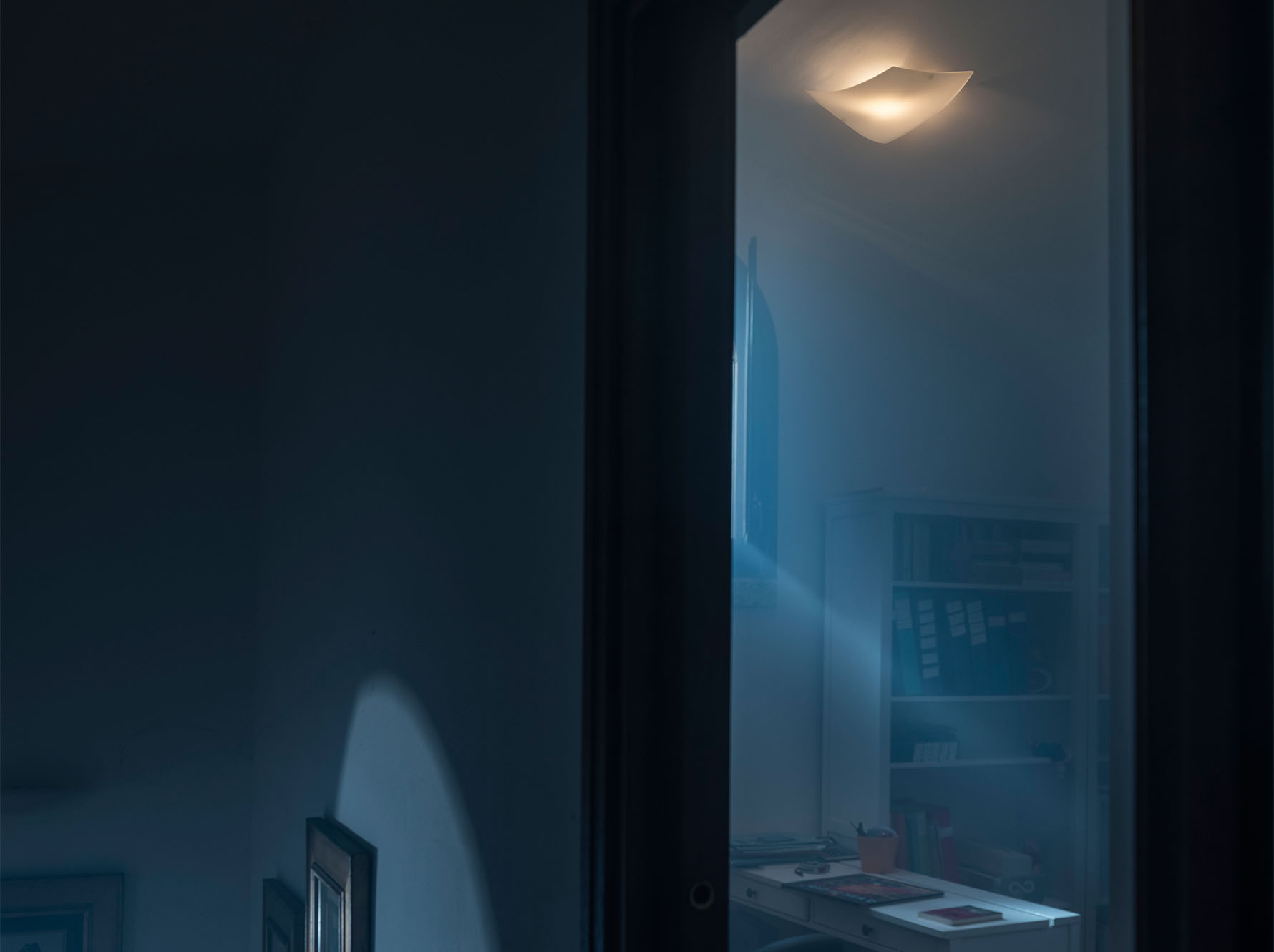 Folio by Foscarini, minimalist wall light with hand-blown satin glass, Troy Michigan.
