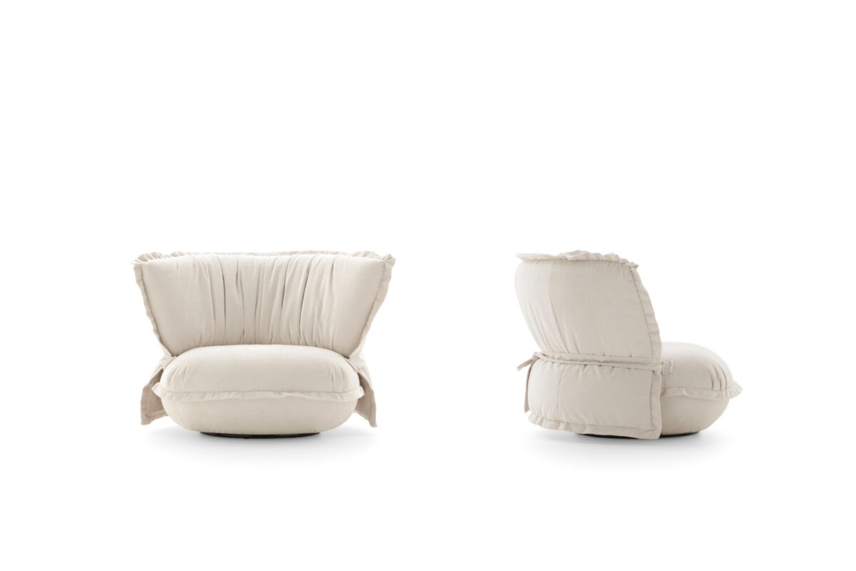 “Modern Puppet armchair by Ditre Italia – stylish occasional chair with rounded form and premium fabric finish”