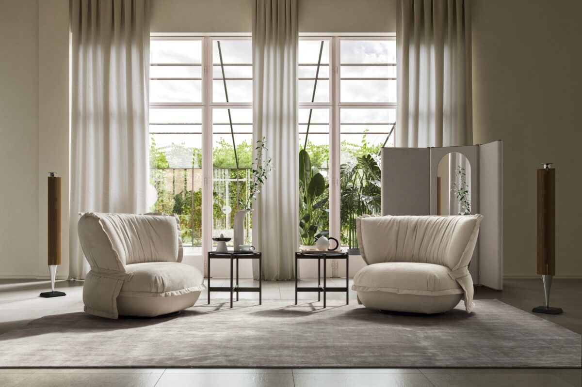 “Ditre Italia Puppet – contemporary accent chair featuring elegant curves, deep seat, and tailored upholstery”
