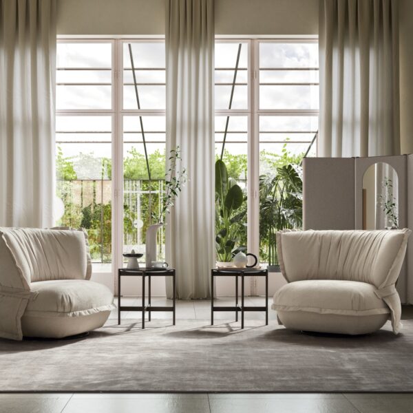 “Ditre Italia Puppet – contemporary accent chair featuring elegant curves, deep seat, and tailored upholstery”