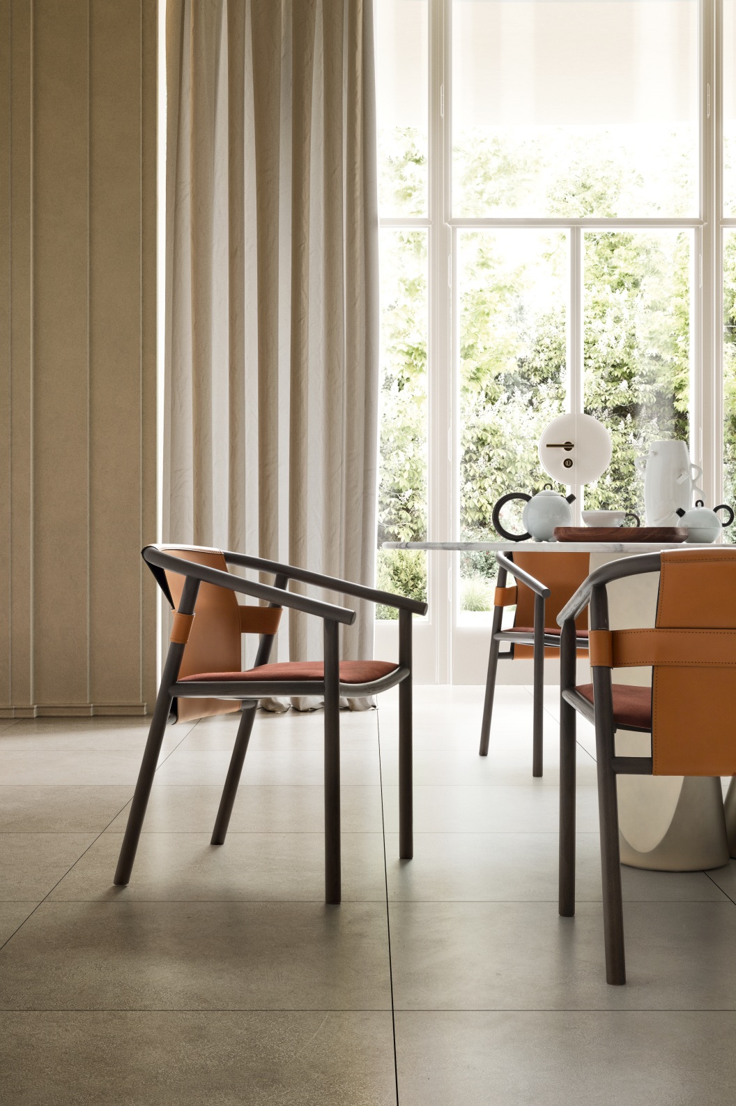 “Isa chair by Ditre Italia – modern Italian chair with elegant curved backrest and minimalist profile”