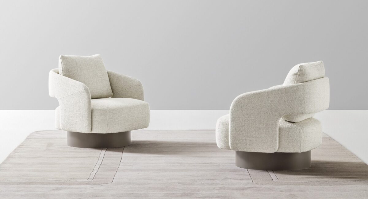 “Ditre Italia 356 – sculptural armchair with timeless curves, tailored fabric, and comfortable proportions”