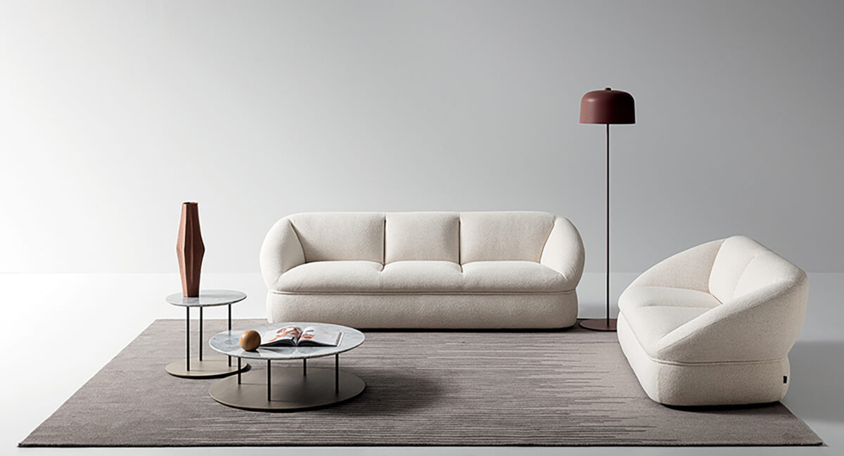 “Ditre Italia Alta – contemporary armchair featuring sleek lines, plush padding, and tailored craftsmanship”