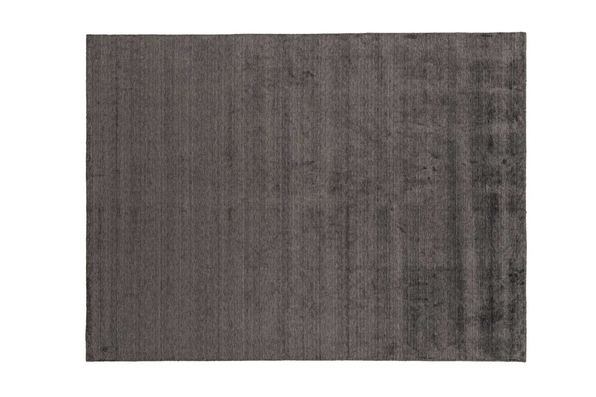 “Ditre Italia GLINT – premium area rug combining minimalist design with luminous fabric detailing”