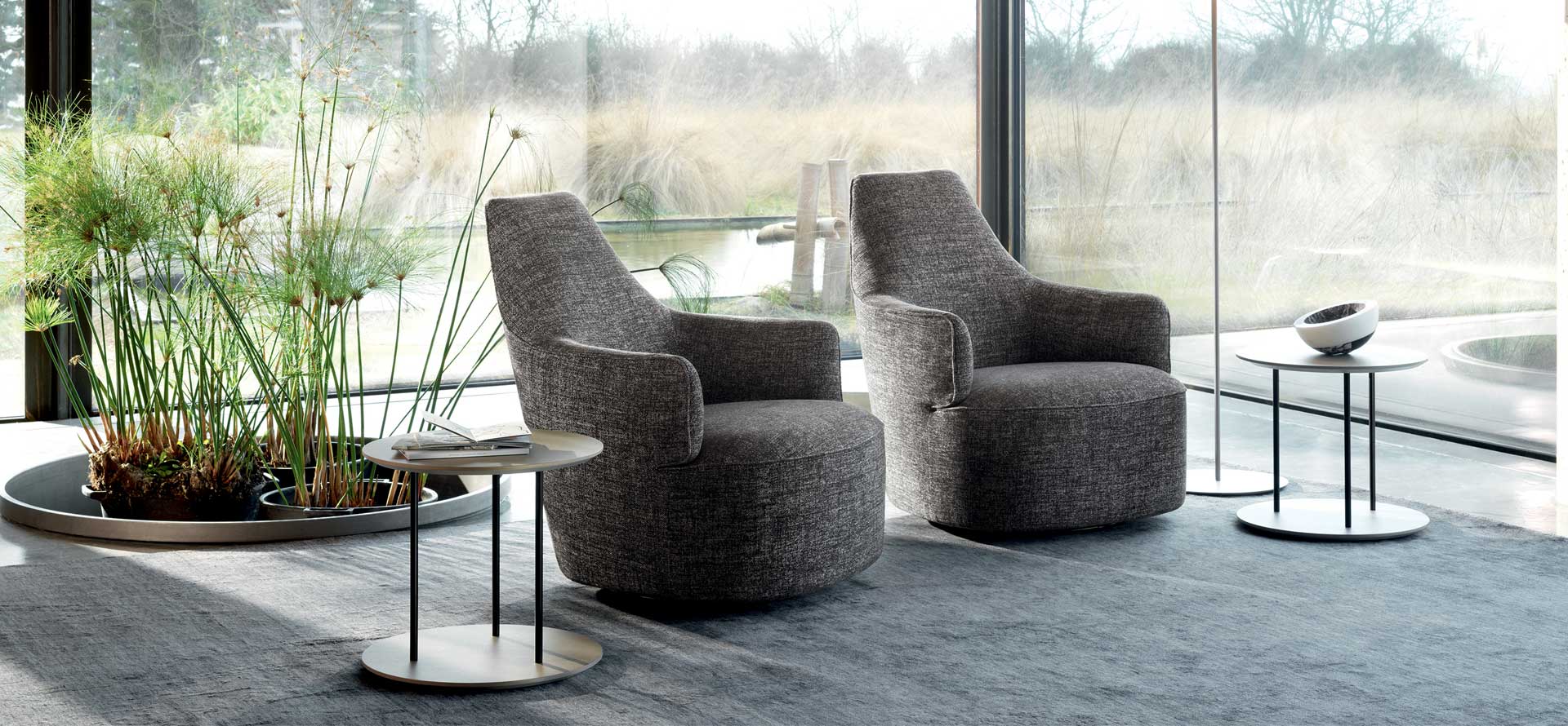 “LUNA armchair by Ditre Italia – modern Italian lounge chair with crescent-shaped backrest and elegant upholstery”