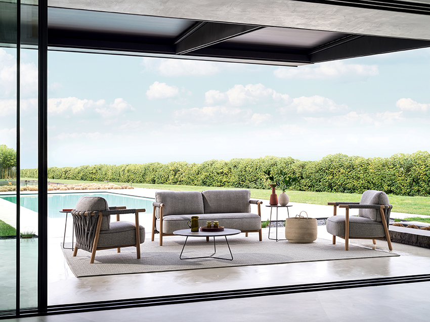 “Nathy armchair by Ditre Italia – modern Italian lounge chair with wraparound backrest and elegant upholstery”