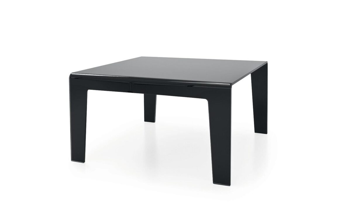 “Frog by Sovet – sculptural dining table made from curved tempered glass for a sleek, modern look”