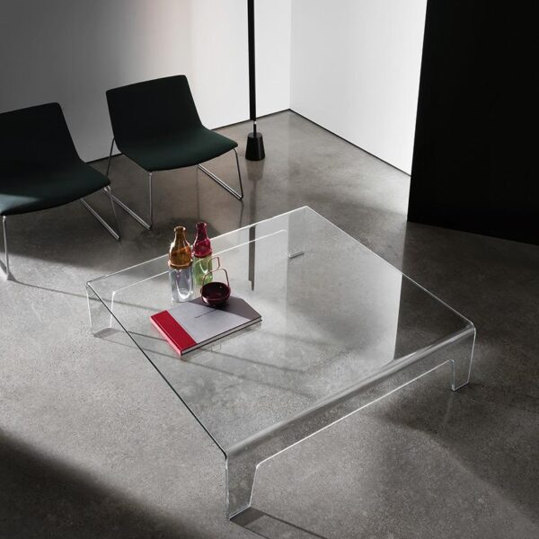 “Sovet Frog – contemporary all-glass table featuring fluid lines and minimalist monolithic form”