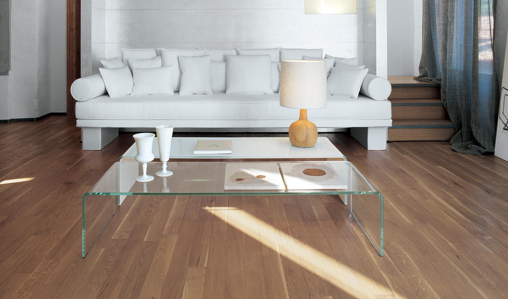 “Sovet Bridge Collection – contemporary coffee tables featuring minimalist U-shaped bent glass structure”