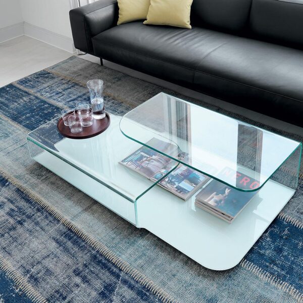 “Hug Coffee Table by Sovet – modern Italian table featuring curved metal legs that embrace a sleek round top”