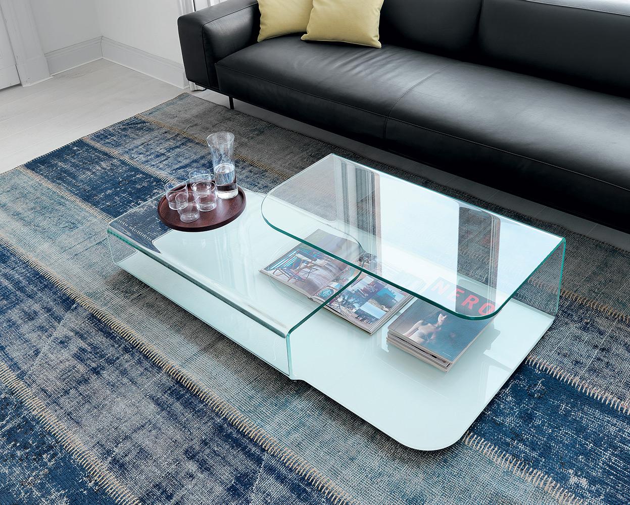“Hug Coffee Table by Sovet – modern Italian table featuring curved metal legs that embrace a sleek round top”