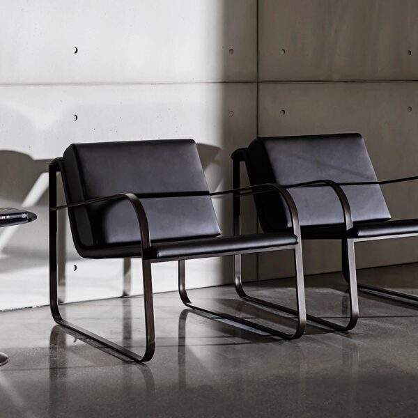 “Sovet Bugatti collection – contemporary armchair with refined silhouette and elegant Italian craftsmanship”