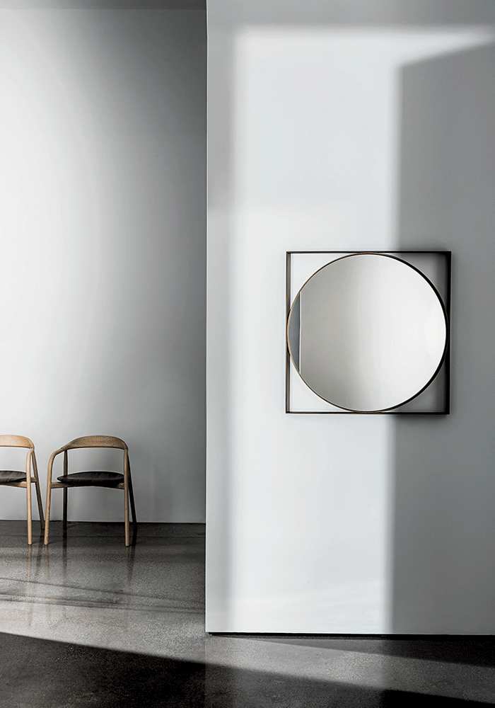 “Geometric wall mirror by Sovet – designer mirror combining sharp lines and modern elegance”