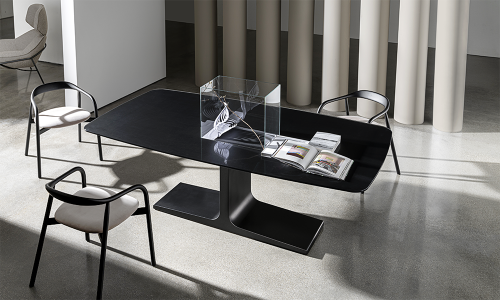 “Sovet Palace Shaped Extensible Table – contemporary designer dining table featuring organic silhouette and smooth extension mechanism”