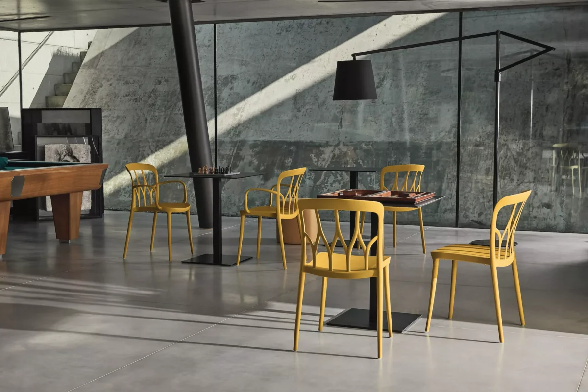 Bontempi Galaxy table paired with upholstered dining chairs