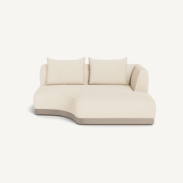 “Angled shot of Amalfi Curved Chaise Right – teak frame and plush weather-resistant cushions”