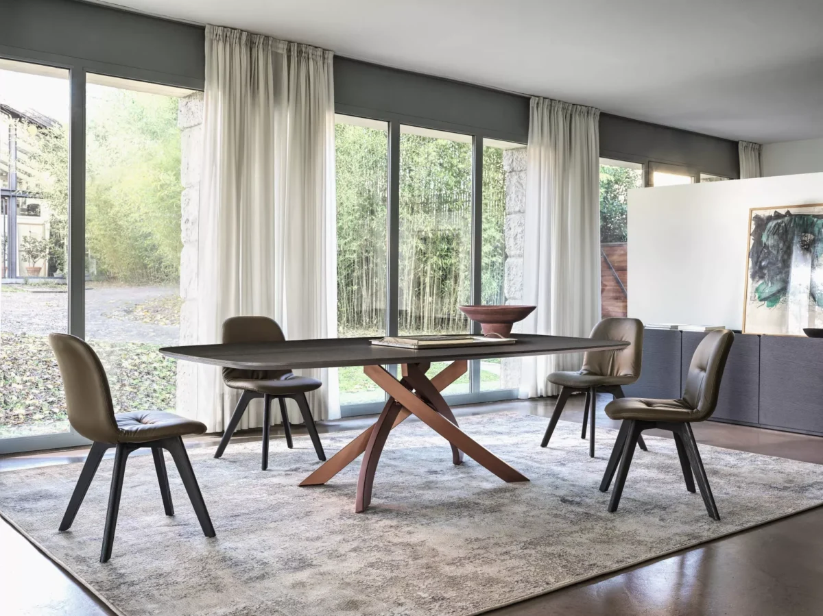 Chantal dining chair by Bontempi in Royal Oak, Michigan – Upholstered seat with tufted accents and angled metal legs.