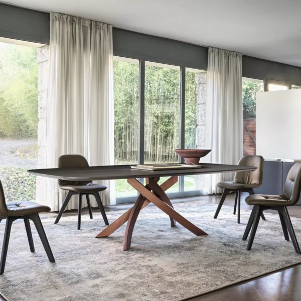 Chantal dining chair by Bontempi in Royal Oak, Michigan – Upholstered seat with tufted accents and angled metal legs.