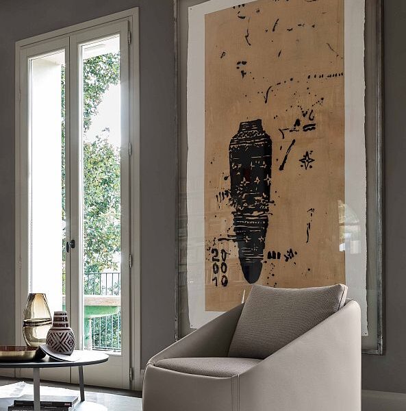 “BEND armchair by Ditre Italia – modern Italian lounge chair with flowing curves and enveloping backrest”