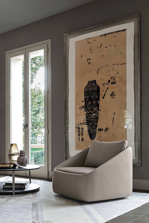 “BEND armchair by Ditre Italia – modern Italian lounge chair with flowing curves and enveloping backrest”