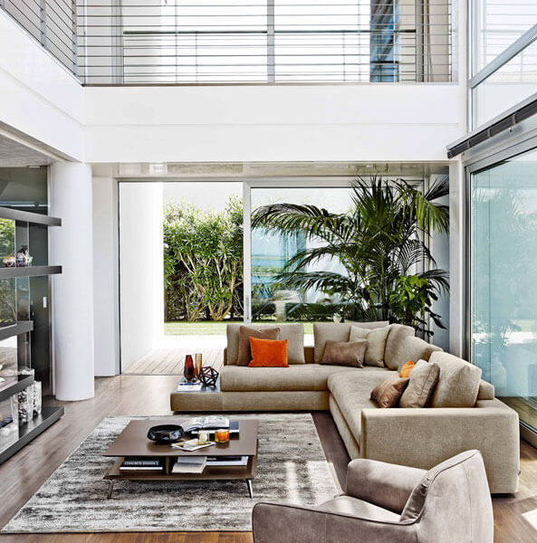 “Jewelry by Ditre Italia – contemporary Italian armchair featuring sleek lines and plush padded comfort”