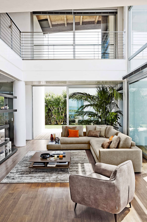 “Jewelry by Ditre Italia – contemporary Italian armchair featuring sleek lines and plush padded comfort”