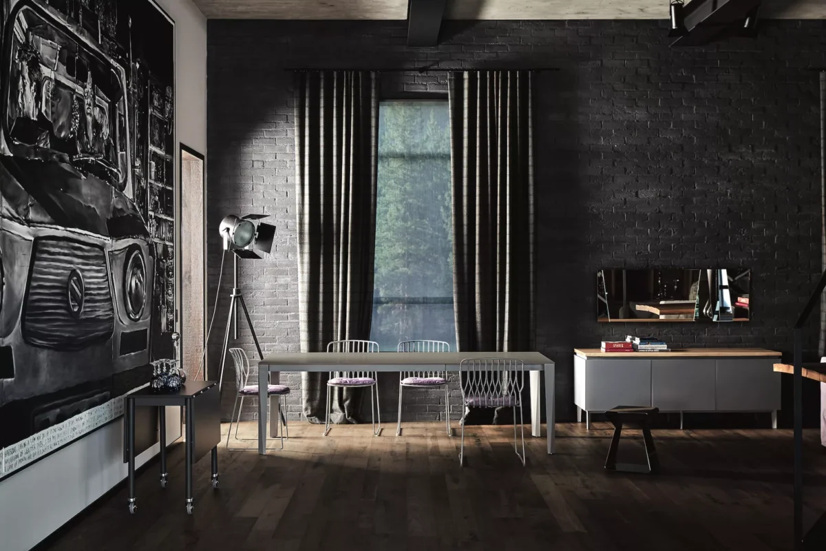 Bontempi Freak chair paired with sleek glass‑top table