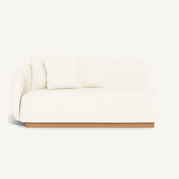 “Left-facing Como 2-seat outdoor sofa – minimalist profile with plush cushions and low-slung frame”