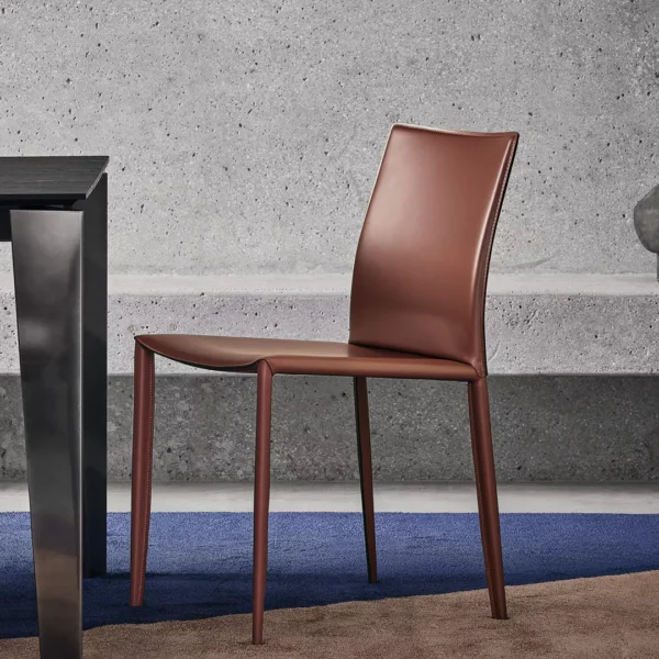Linda by Bontempi chair with softly curved upholstered backrest and slender metal legs