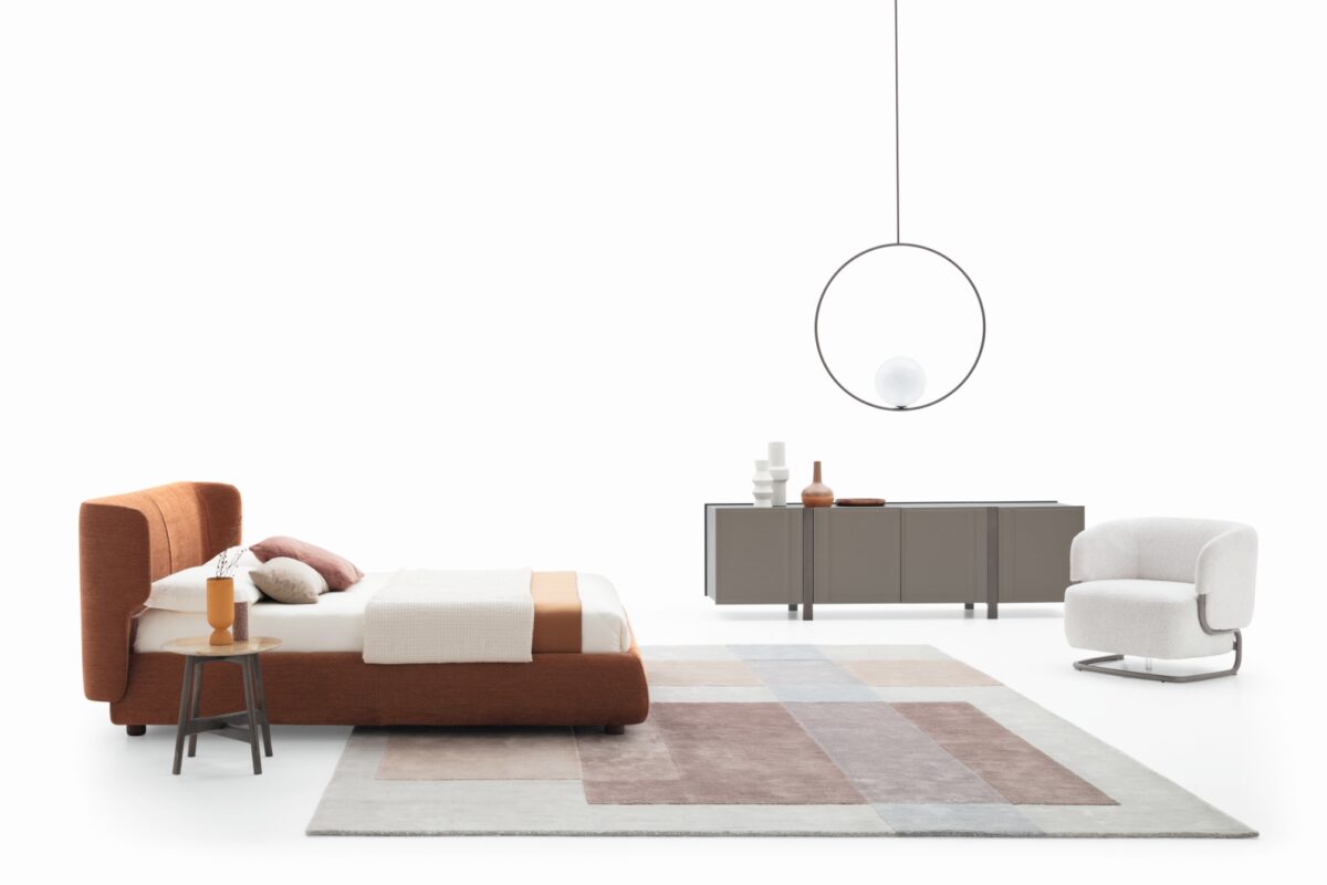 “Claire upholstered bed by Ditre Italia – sophisticated Italian bedroom furniture with clean lines and cushioned support”