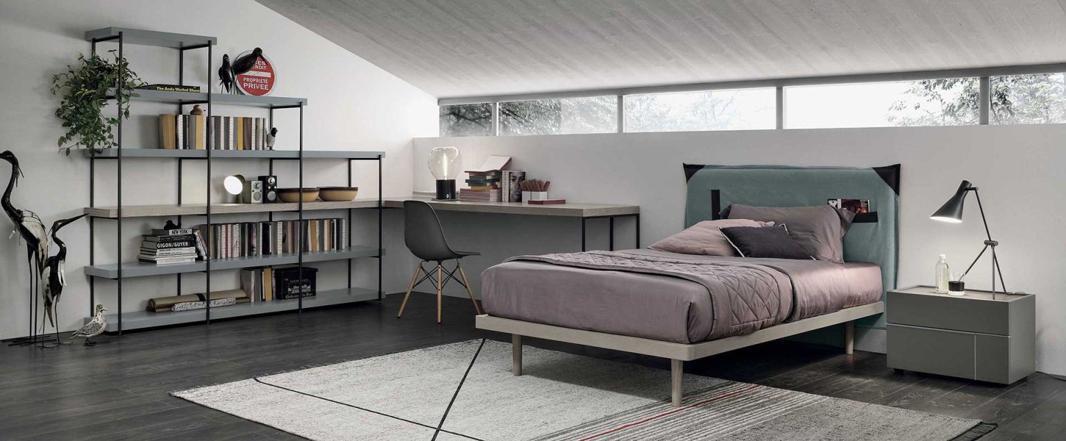 “Tomasella Composition 07 kids’ room – functional layout with open shelving, built-in wardrobe, and colorful accents”