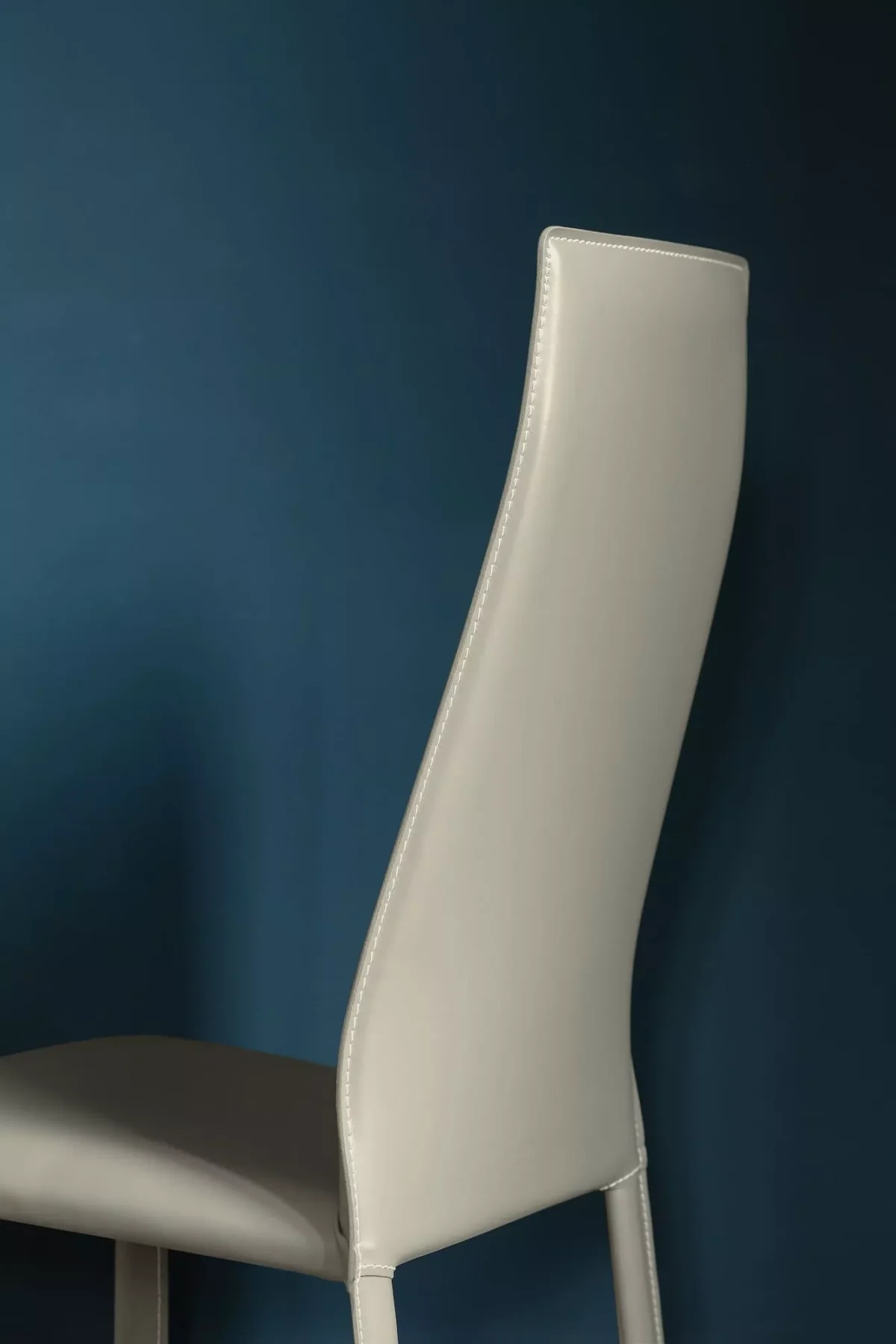 Delilah by Bontempi chair with plush upholstered seat and slender frame
